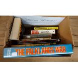 A box containing a quantity of assorted war related books including The Falklands War, etc.