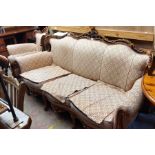 A reproduction ornate part show frame three piece suite comprising a pair of fauteuil armchairs