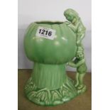 A green glazed SylvaC vase depicting two pixies climbing a toadstool