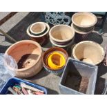 A large quantity of assorted garden pots of varying design