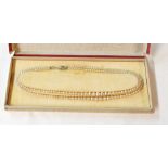 A vintage boxed simulated double string pearl necklace with marked 'sterling' clasp