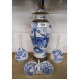 An antique Chinese crackle glaze lidded jar with blue hand painted decoration depicting figures in a