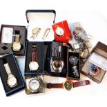 A box containing a collection of boxed and loose mainly gentlemen's wristwatches including