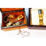 A 1930's dressing table trinket box containing assorted wristwatches - sold with a modern 'London