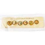 A vintage carded set of six Guinness advertising buttons