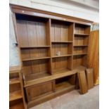 A 2.04m vintage oak two part library bookcase with moulded cornice and adjustable open shelves