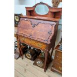 A 76cm French ornate bureau with later stained finish, low raised back with mirror and flanking