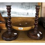 A pair of old barley twist candlesticks with brass sconces - sold with a large turned wooden bowl
