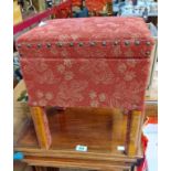 A 1930's upholstered sewing box/stool with lift-top, studded detail and moulded legs