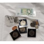 A tin containing a selection of coins and banknotes, including vintage £1 note, George III half-