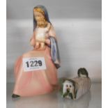 A Goebel figurine depicting The Madonna and Child - sold with a small studio pottery figurine