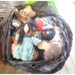 A bag containing a quantity of old ragdolls, Teddy bears and other soft toys
