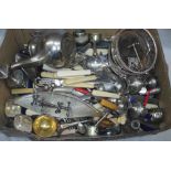 A box containing a quantity of silver plated items including a pair of wine coasters, teaware,
