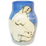 A Dennis Chinaworks vase with tube lined decoration depicting polar bears on a blue ground base -