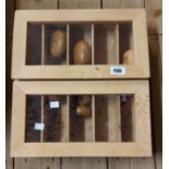 Two wooden display boxes with perspex tops containing a quantity of Wooden Wonders Ltd. timber