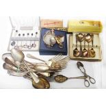 A box containing a quantity of silver plated cased and loose cutlery