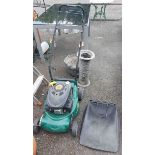A 4 stroke petrol lawn mower with self propelled drive, 40cm diameter cut and grass box