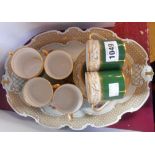 A set of six Spode bone china coffee cans and saucers in the Oaklea pattern - sold with a German