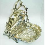 An old ornate silver plated folding entree dish with pierced liner and decorative cast stand - one