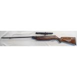 A vintage German air rifle with wooden stock - sold with a sight