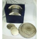 A boxed set of modern silver plated coasters - sold with other loose examples