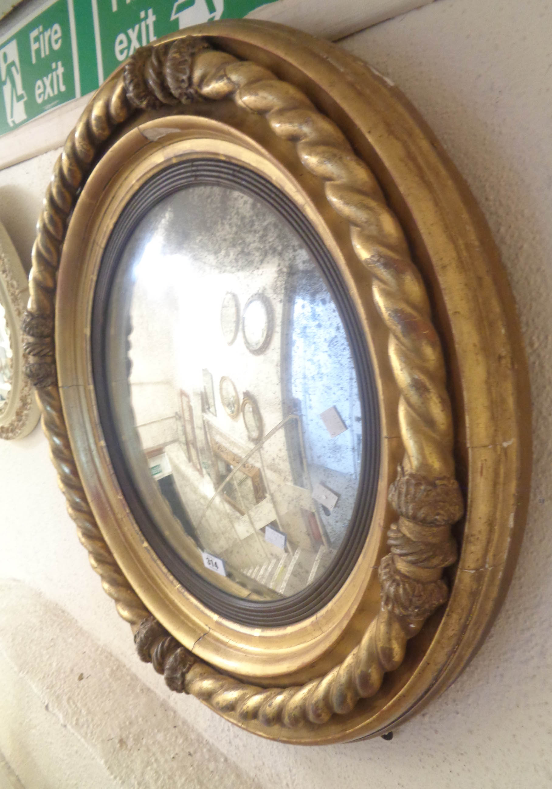 A 71cm diameter late Georgian gilt framed convex wall mirror with reeded ebonised slip border within - Image 4 of 6