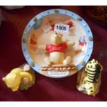 Two Royal Doulton Winnie the Pooh figurines comprising Pooh Counting the Honeypots WP12 and Tigger