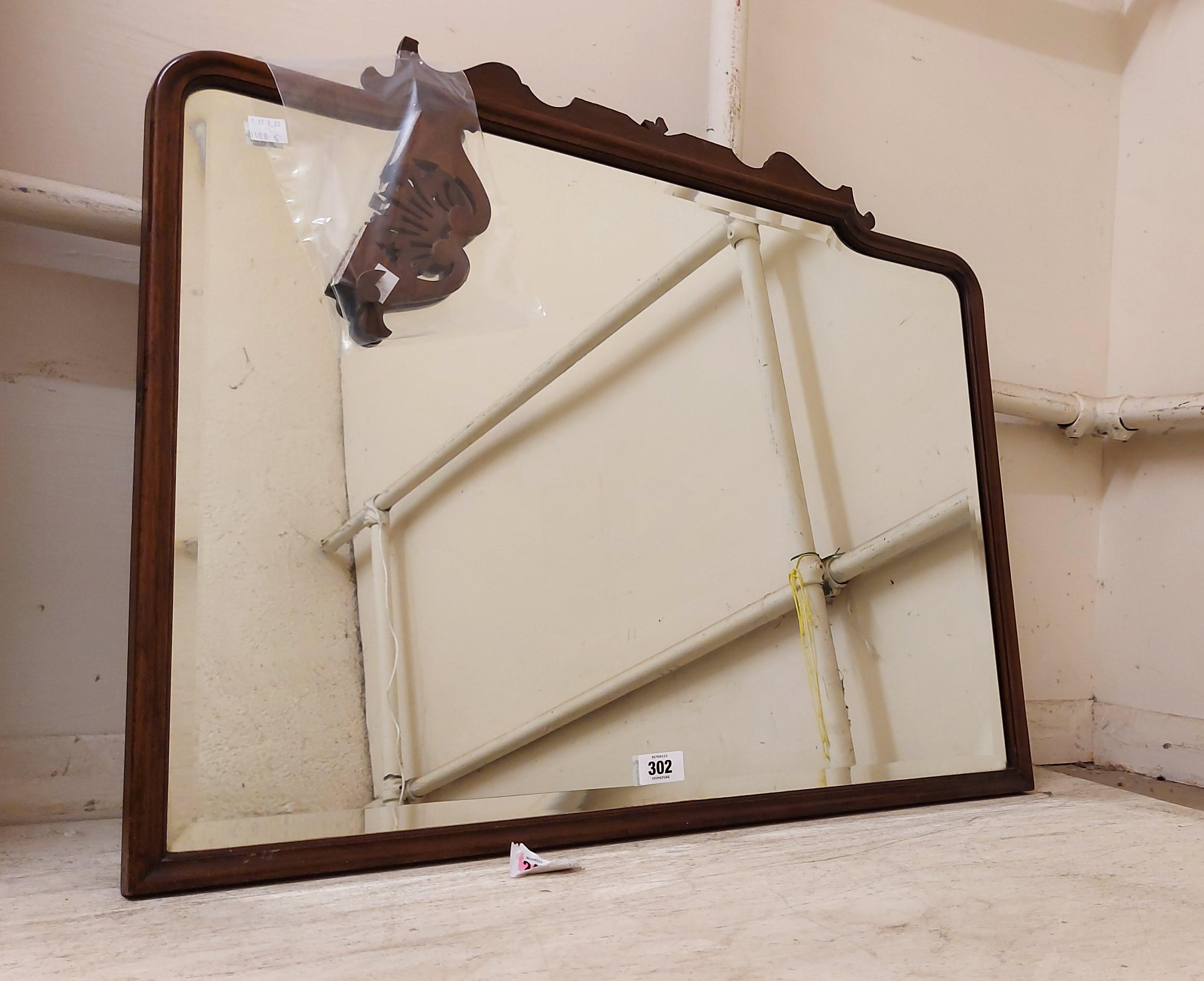 A 1930's mahogany framed bevelled oblong wall mirror with damaged pediment - most pieces included