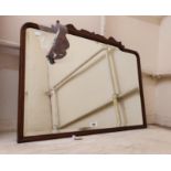 A 1930's mahogany framed bevelled oblong wall mirror with damaged pediment - most pieces included