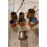 Two sets of graduated copper measures - sold with another single similar