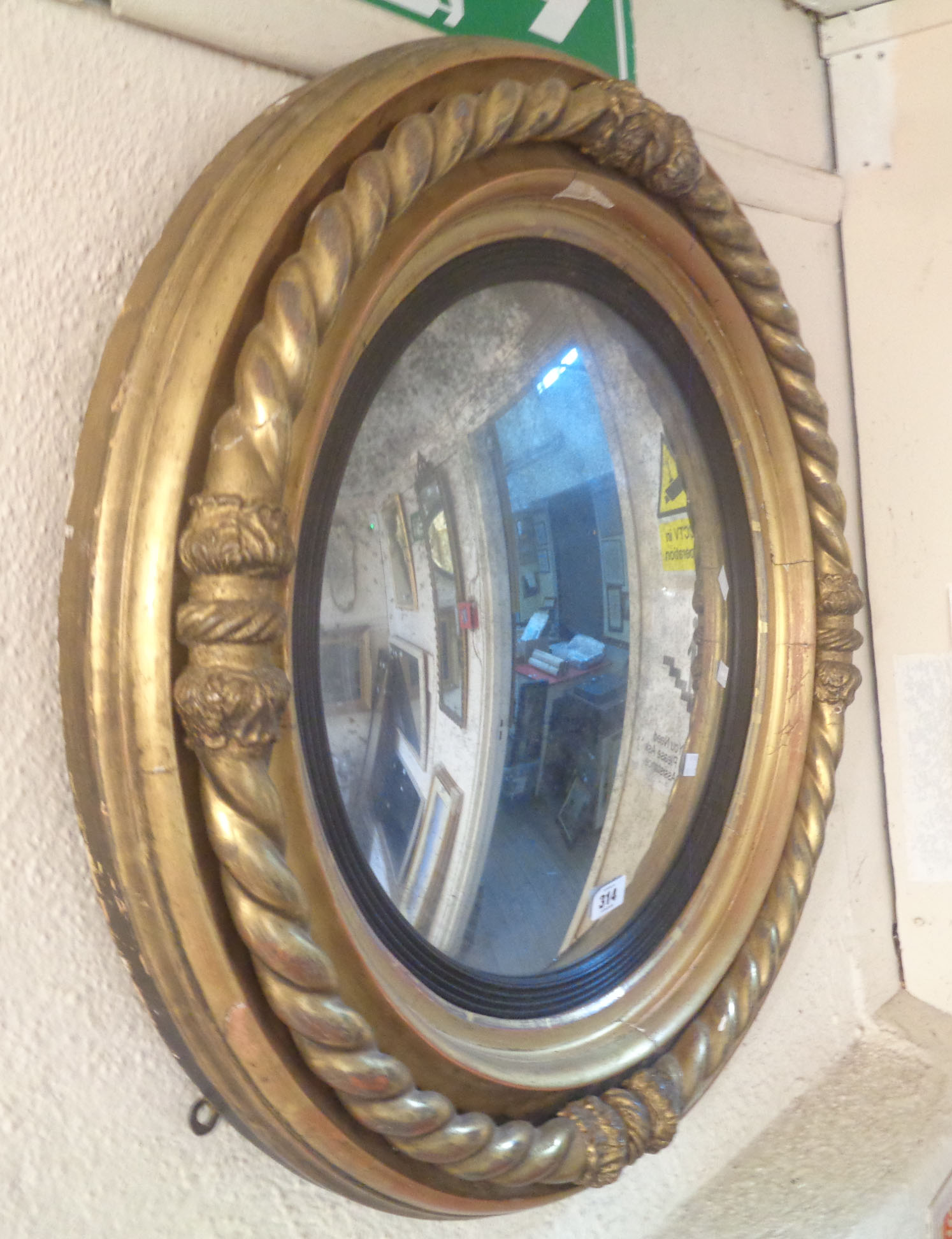 A 71cm diameter late Georgian gilt framed convex wall mirror with reeded ebonised slip border within - Image 6 of 6