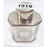 A small continental white metal tea caddy in the antique style of canted oblong form with push-fit