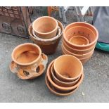 A quantity of assorted terracotta garden pots