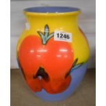 A Poole Pottery vase with stylised painted flowerheads in a bold colour palette