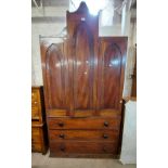 A 1.13m 19th Century mahogany Gothic style two part linen press with central mitre shaped folding