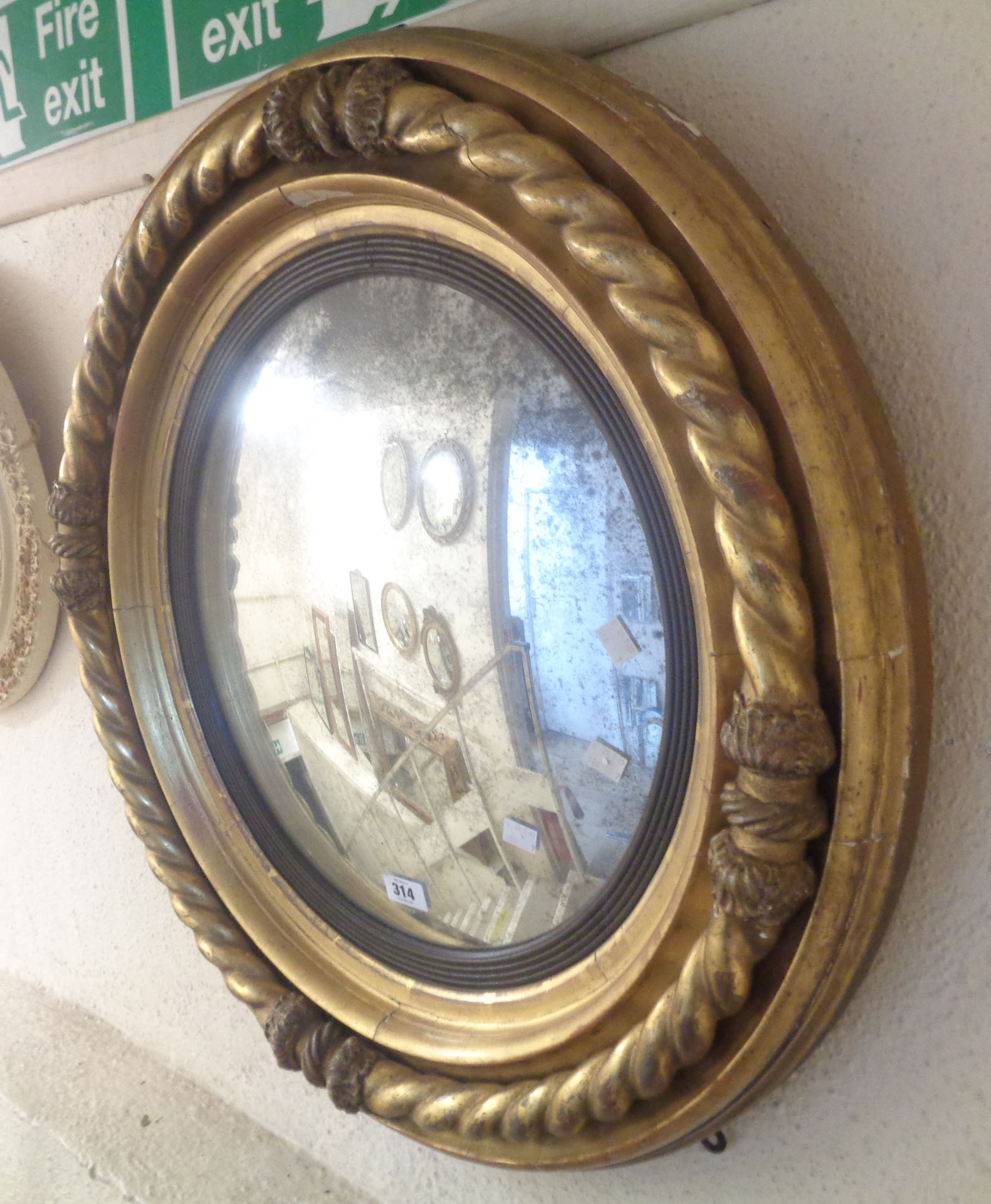 A 71cm diameter late Georgian gilt framed convex wall mirror with reeded ebonised slip border within - Image 5 of 6