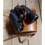 A pair of vintage Lupinus 10X50 binoculars in original leather carry case