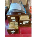 A vintage wooden filing drawer containing a large quantity of negatives dating from the 1920's to