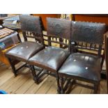 Three matching late Victorian stained wood framed panel back dining chairs with brass studded tooled