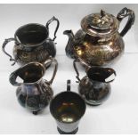 A silver plated four piece tea set and marriage cup