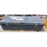 A vintage military transit trunk marked for J.P. McCarthy