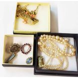 Three small boxes containing vintage costume jewellery and an Accurist goldtone lady's wristwatch