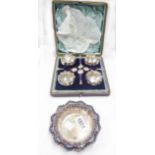 A cased set of four silver salts with scalloped rims and four original spoons - Sheffield 1893-