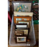 A crate containing a quantity of framed embroidered panels of various size and subject