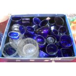 A small box containing a quantity of blue glass liners, etc.