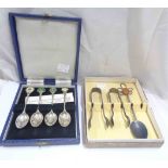 A cased set of four enamelled silver commemorative United Kingdom coffee spoons - sold with two