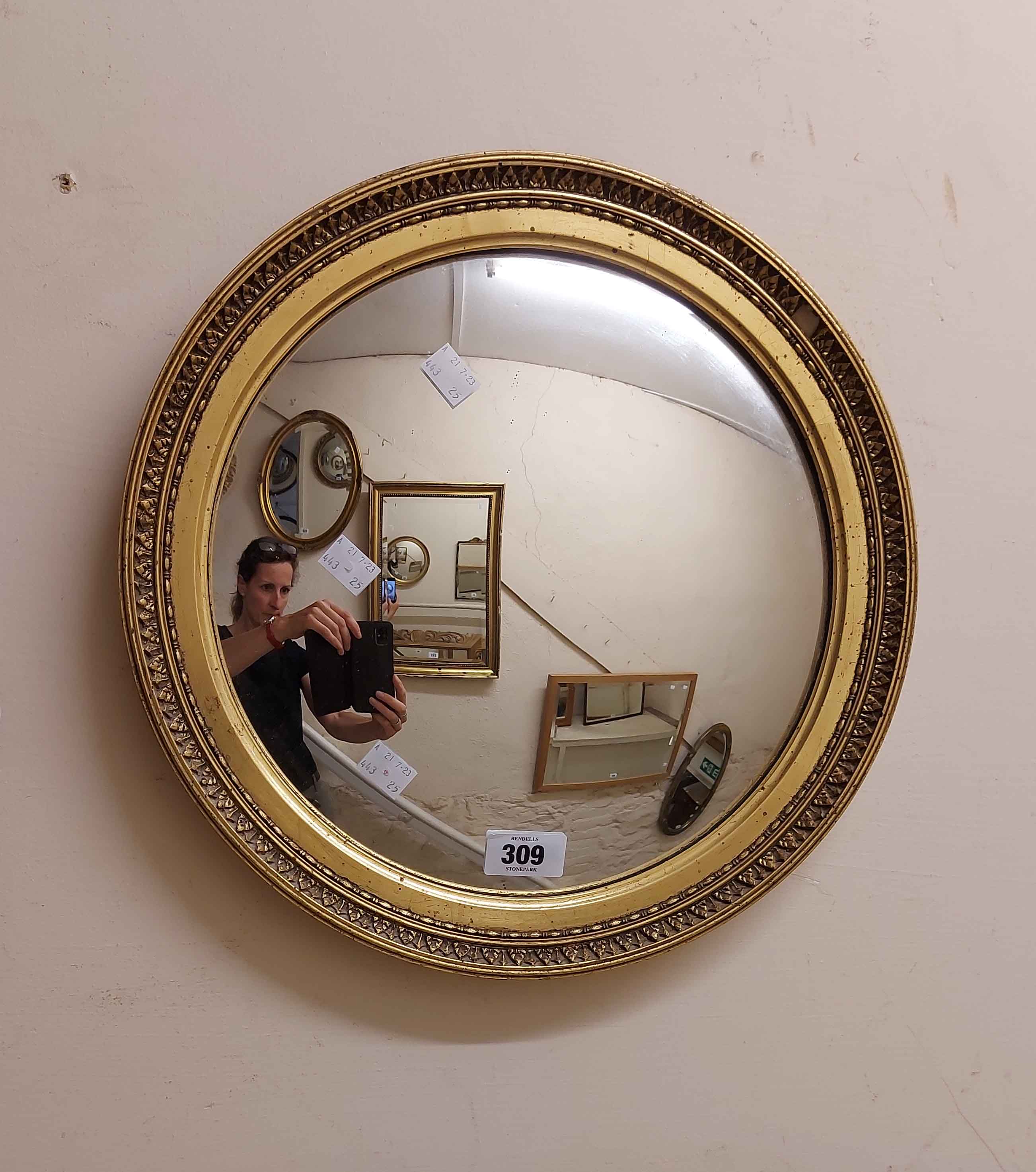 A 37cm diameter vintage Aisonea gilt framed convex wall mirror