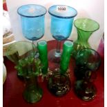 A quantity of green and other glassware comprising vases, goblets, etc.