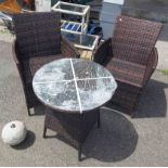 A Chelsea Garden Furniture set comprising two chairs and table in woven brown plastic with white
