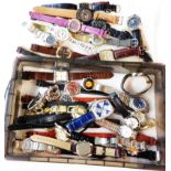 A plastic case containing a large collection of assorted mainly modern gentlemen's wristwatches